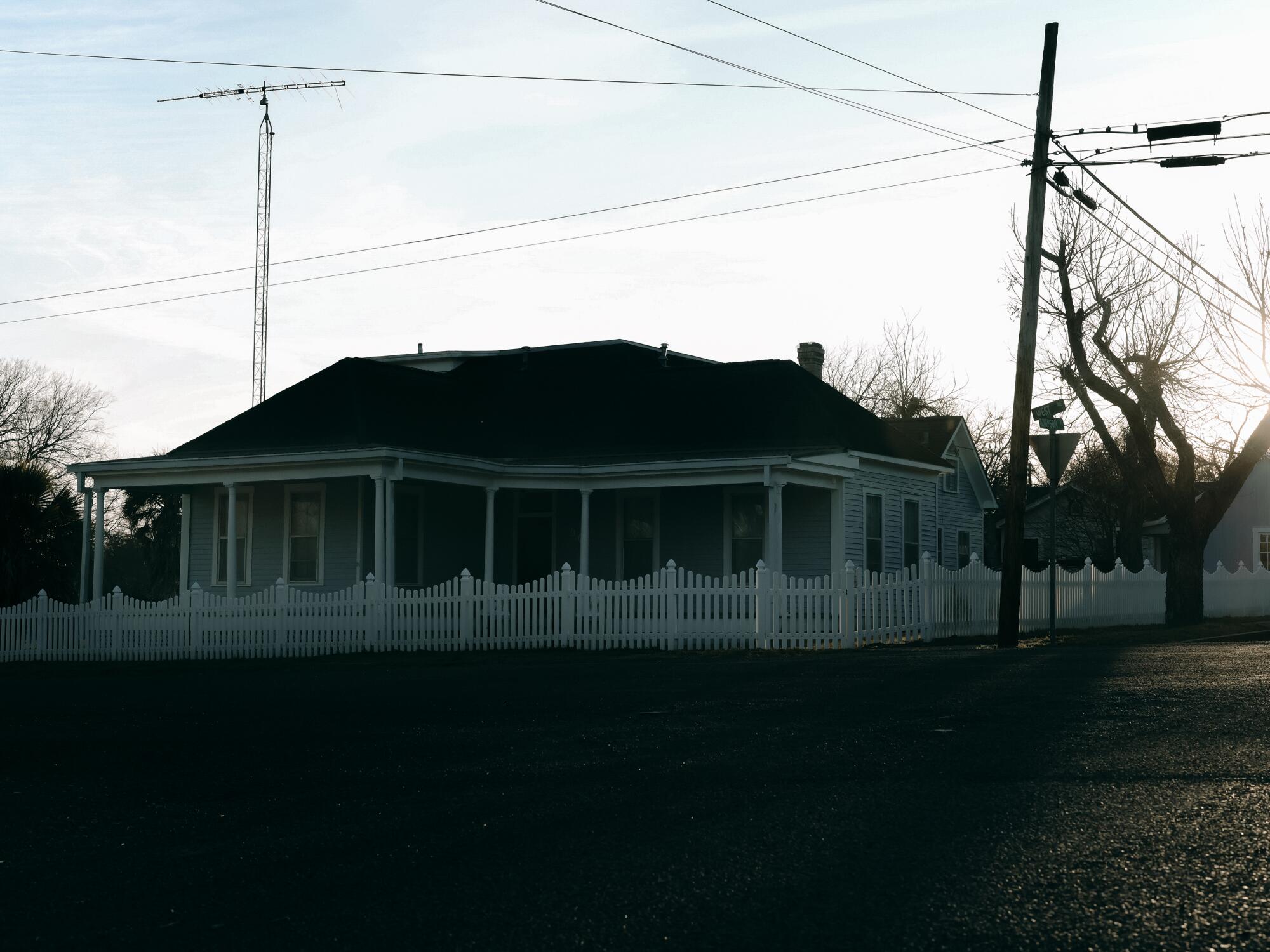 A home with a fence around it.