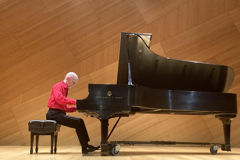 Pianist Stephen Drury performs a sonata by Charles Ives at a concert April 17 at UC San Diego in La Jolla.