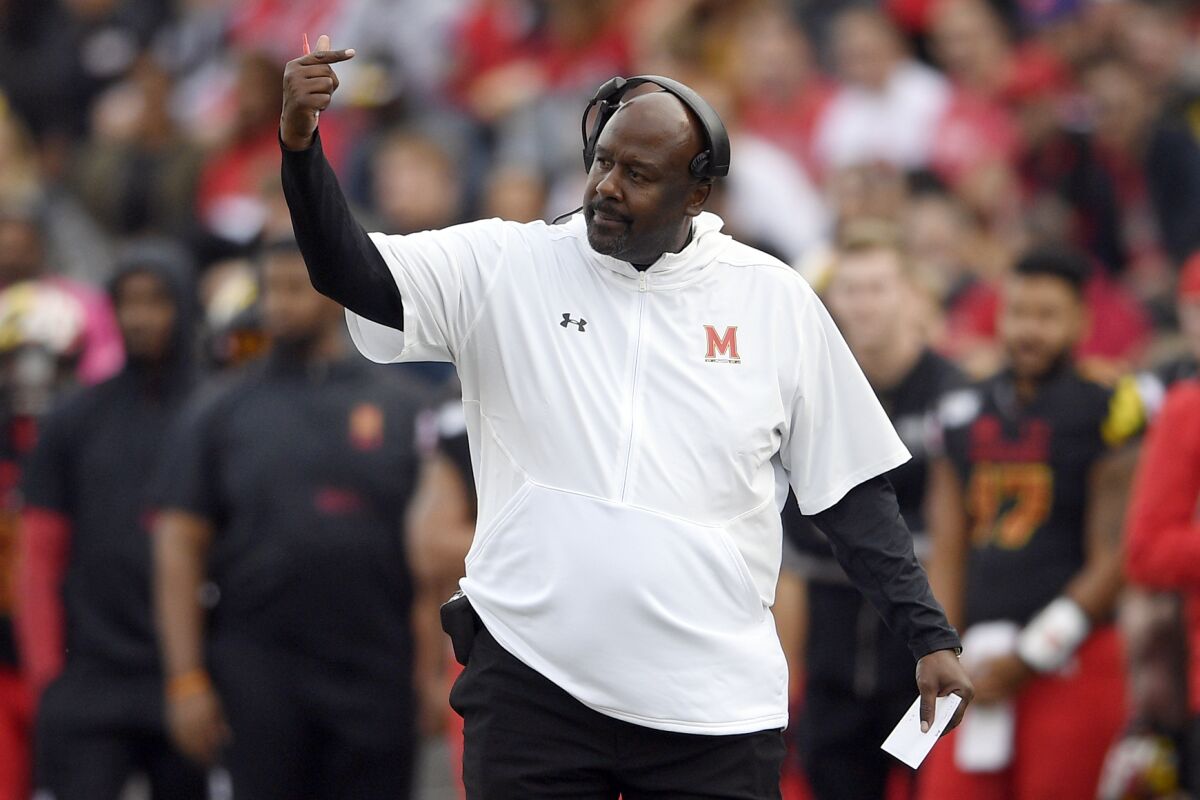 Maryland coach Mike Locksley gestures from the sideline