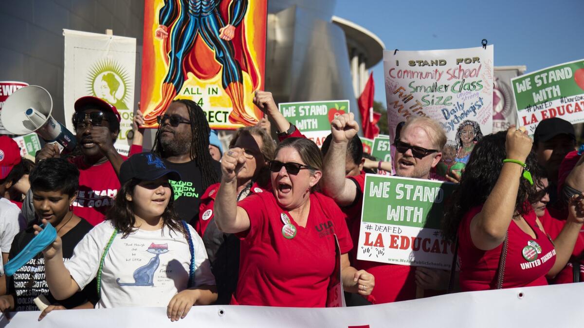 Hundreds of protesters joined in with UTLA to march near the Broad Museum in Los Angeles on Dec. 15.