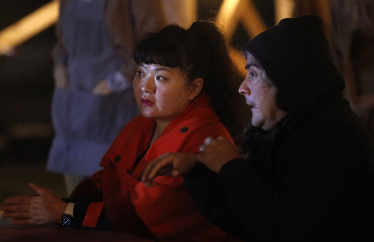 Composers Du Yun, left, and Raven Chacon attend rehearsal for ”Sweet Land" at Los Angeles State Historic Park on Feb. 21, 2020. 