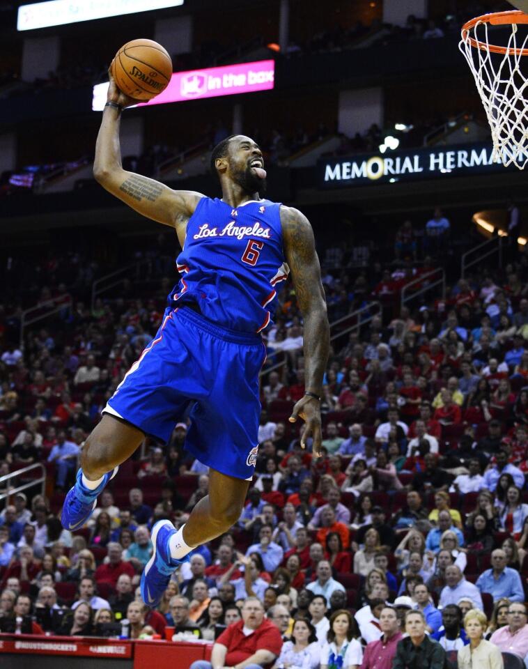 Clippers center DeAndre Jordan dunks during the first half of the Clippers' 118-107 road win over the Houston Rockets on Saturday.