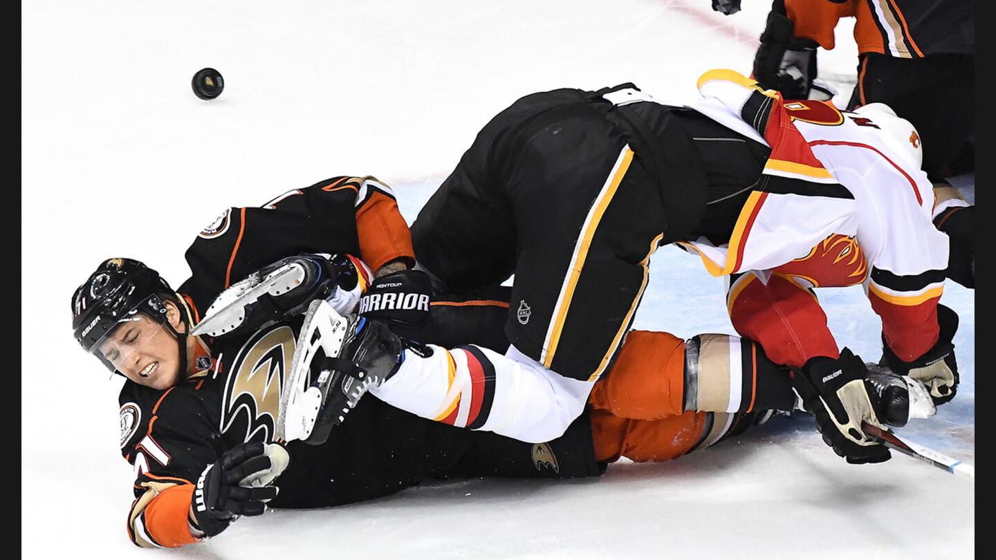 Ducks' Brandon Montour collides with Calgary Flames' Matt Stajan in the second period in Game 1 of the Western Conference Stanley Cup playoffs.