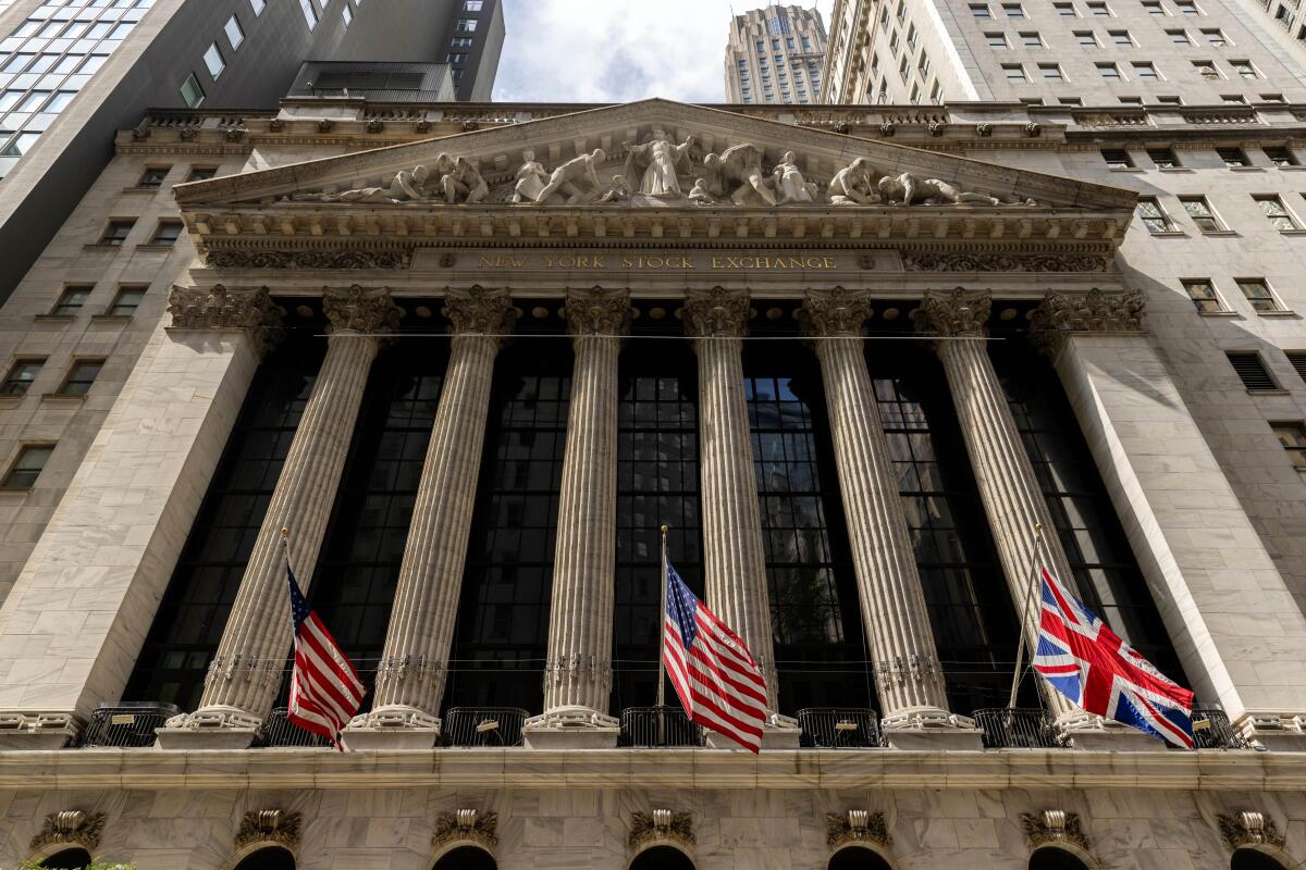 Statues adorn the facade of the New York Stock Exchange