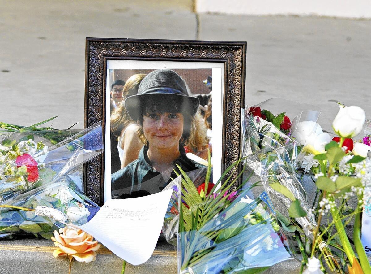 A memorial with a portrait of Drew Ferraro at Crescenta Valley High School on Tuesday, February 14, 2012. Ferraro, a 15 yr. old sophomore, jumped to his death during lunch from a school building the Friday before.