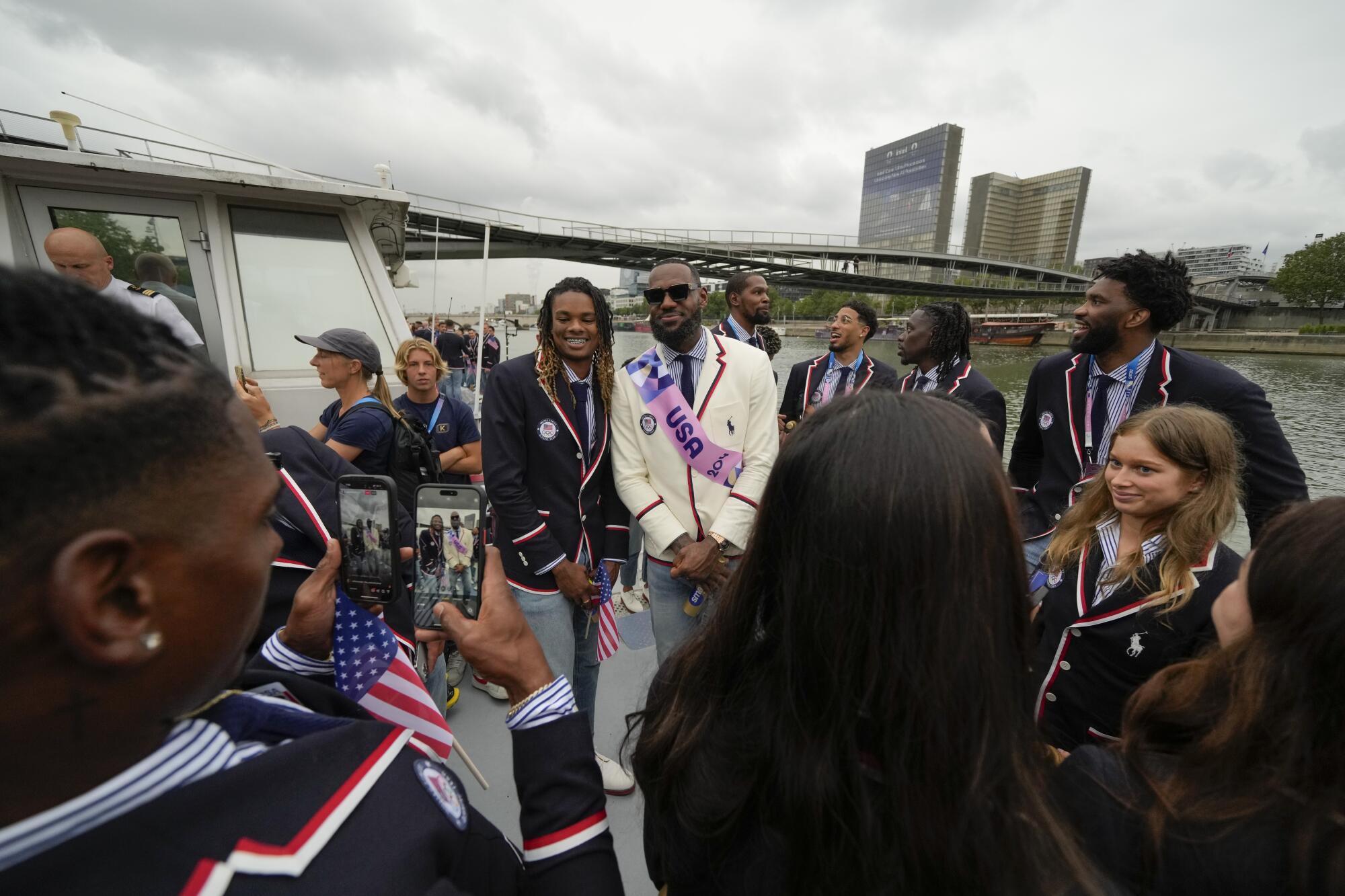 LeBron James posing with Team USA on a boat.