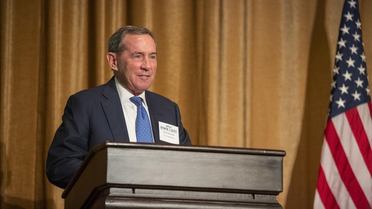 Laguna Beach Mayor Bob Whalen speaks during the State of the City address at the Montage Laguna Beach resort on Thursday. Whalen said he is “quite concerned about the quality of our public discourse” in the city.