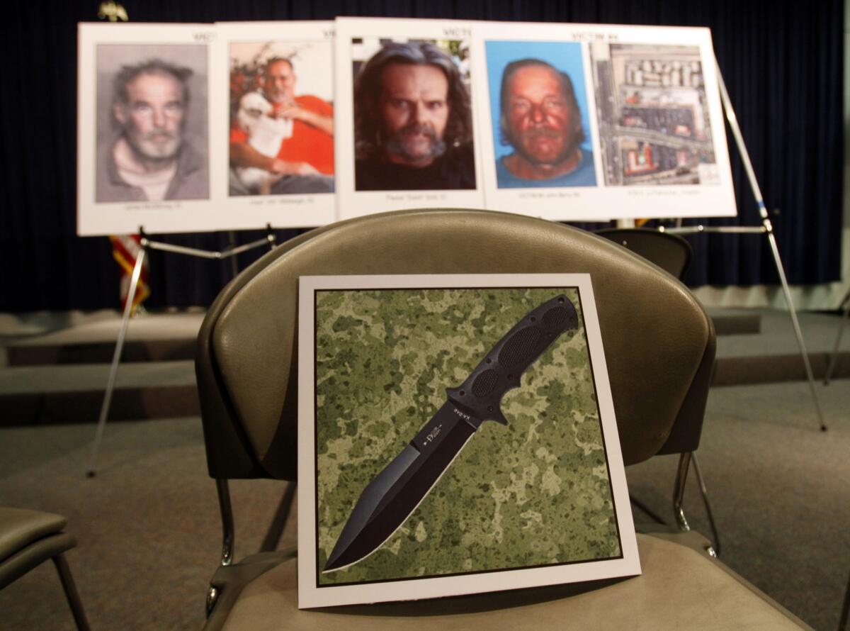 Orange County Dist. Atty. Tony Rackauckas displays a photo of a 7-inch knife similar to the one he says was used by Itzcoatl "Izzy" Ocampo, an accused serial killer who authorities say died after being found sick in his jail cell.