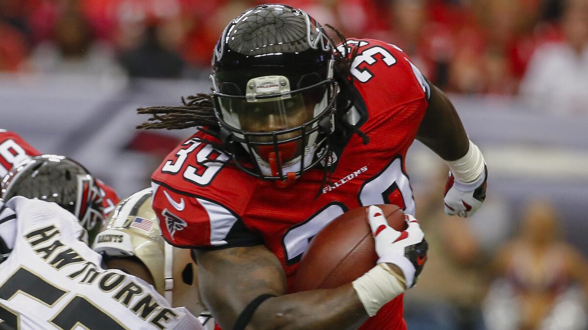 Atlanta Falcons running back Steven Jackson carries the ball during the first half of a 37-34 win over the New Orleans Saints on Sunday. Are the Falcons poised to be one of the surprises of the 2014 NFL season?