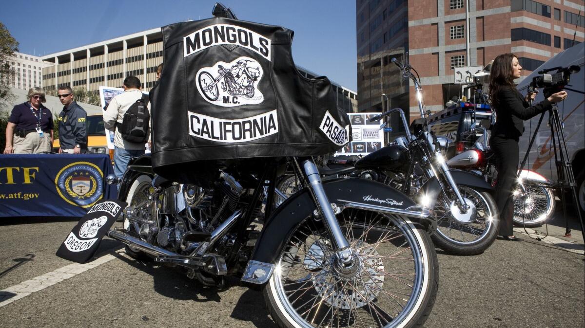 The Mongols motorcycle club logo is seen on a member's jacket at a news conference in Los Angeles.