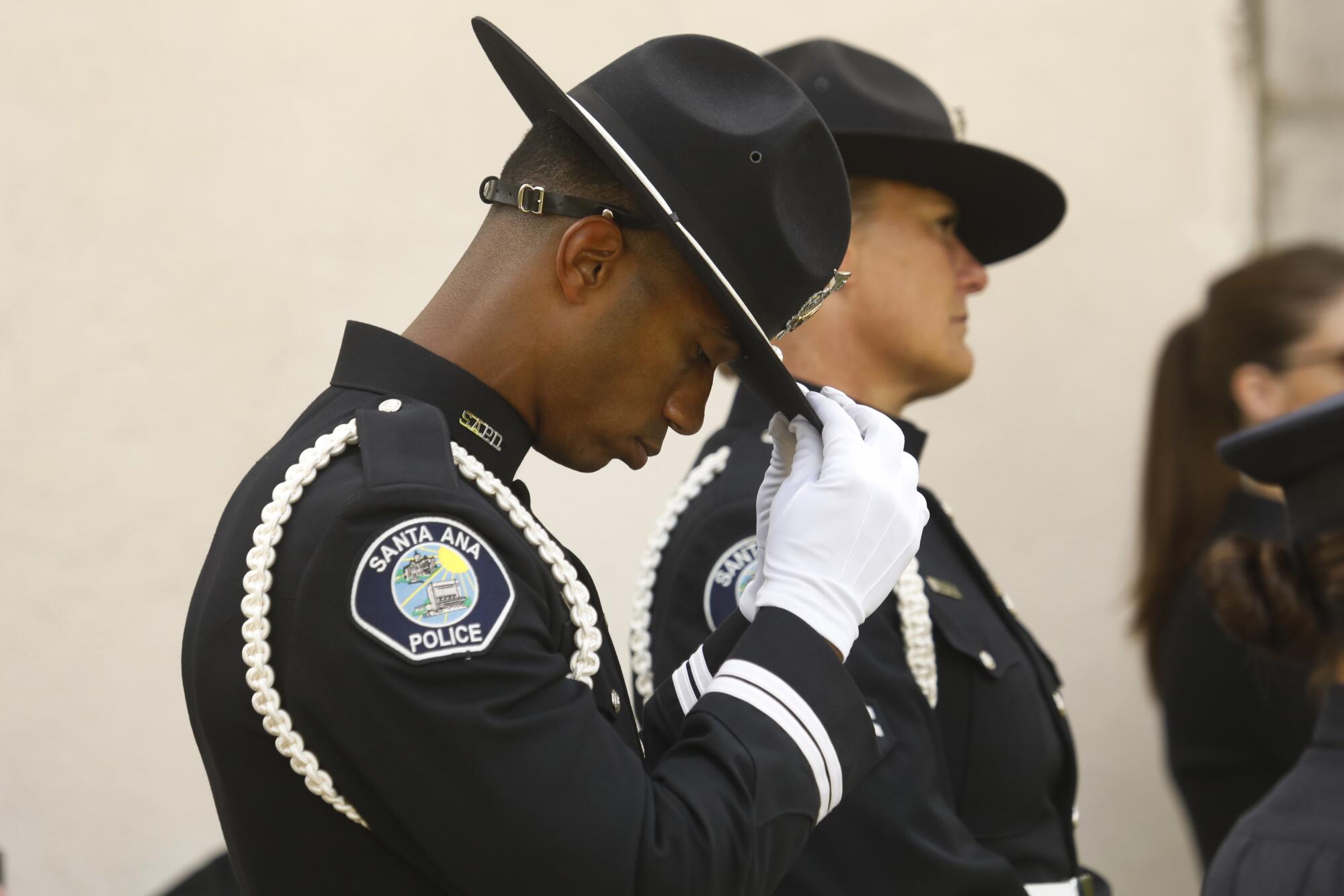 Family, friends, city officials and fellow officers pay tribute