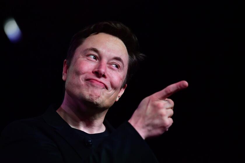 Tesla CEO Elon Musk speaks during the unveiling of the new Tesla Model Y in Hawthorne, California on March 14, 2019. (Photo by Frederic J. BROWN / AFP) (Photo credit should read FREDERIC J. BROWN/AFP via Getty Images)