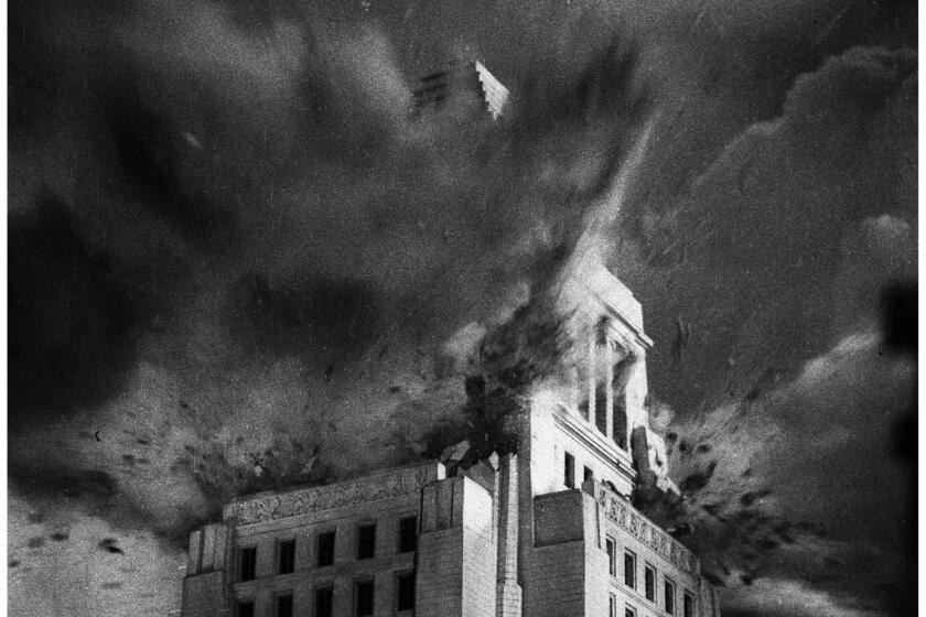 May 8, 1952: Model of Los Angeles City Hall blown up during filming of special effects for 1953 movie War of the Worlds.