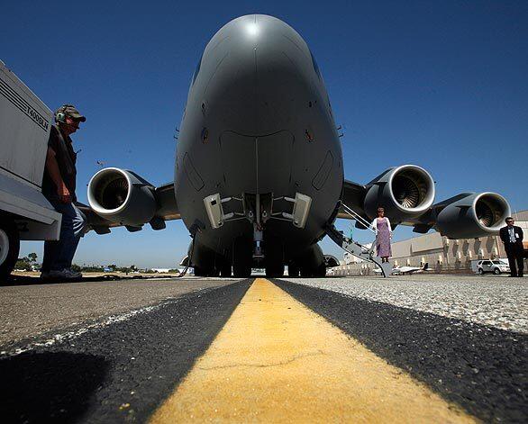 The Boeing C-17 Globemaster III is being prepared at Long Beach Airport for delivery to Hungary as part of the 12-nation Strategic Airlift Capability, which includes 10 NATO nations, Sweden and Finland.