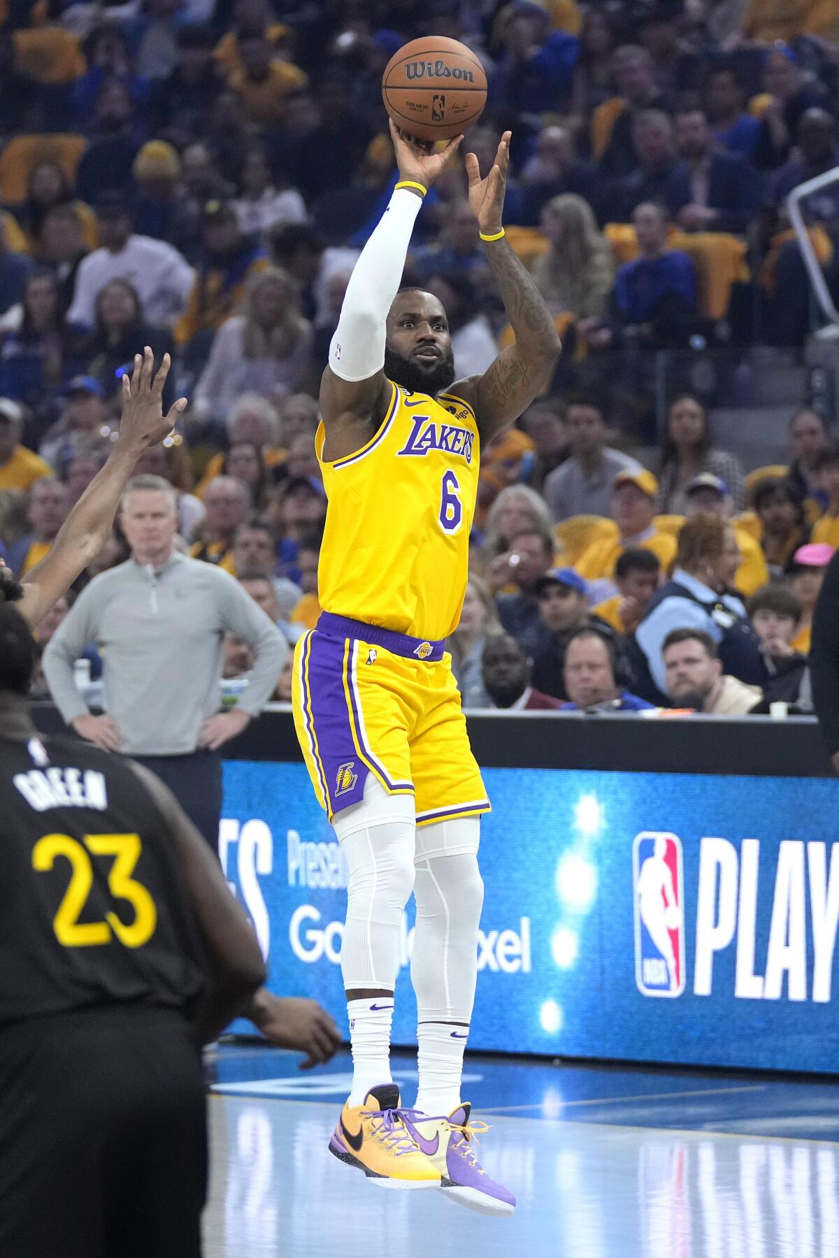 Lakers forward LeBron James pulls up for a jump shot against the Warriors in Game 1.
