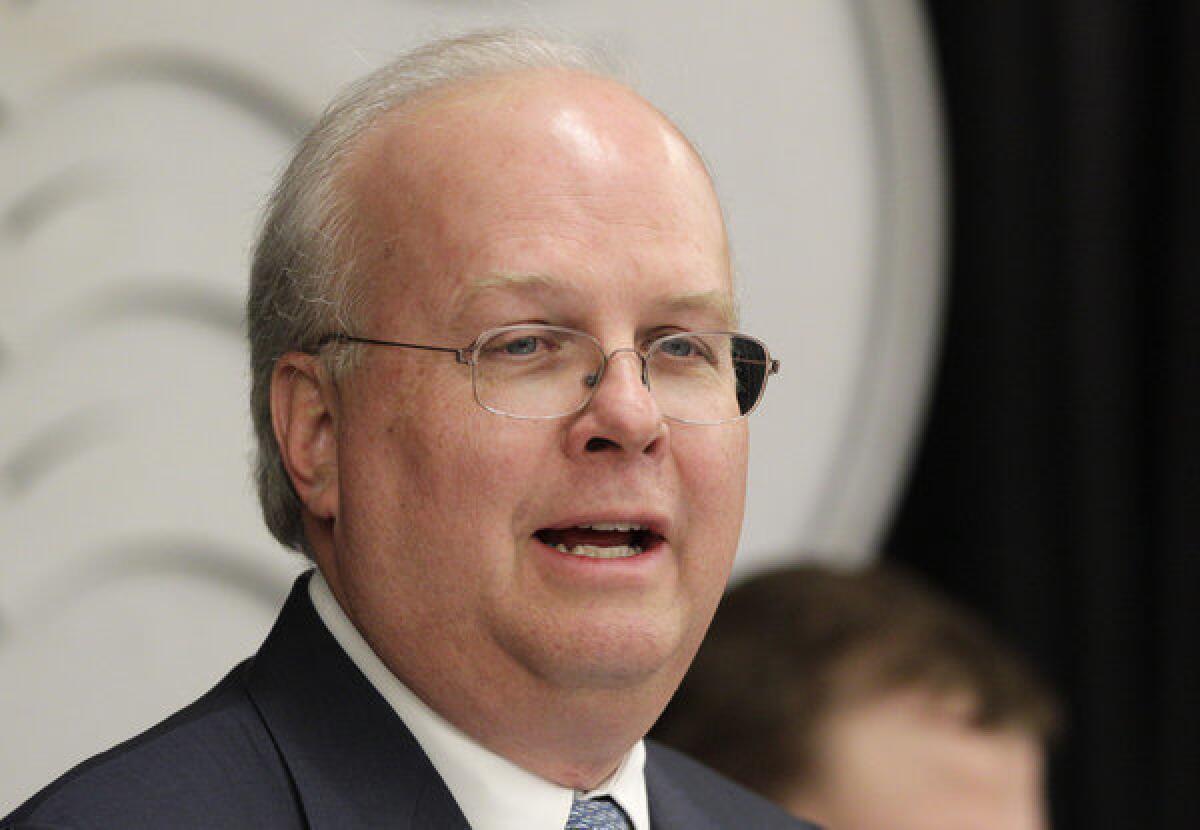 Karl Rove, seen in a file photo, accused President Obama's campaign of using voter suppression in its victory over Mitt Romney.