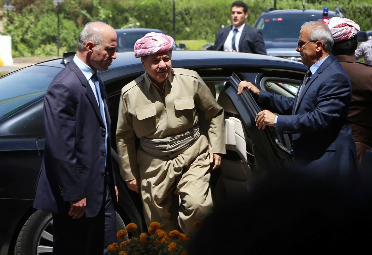 The president of Iraq's semiautonomous Kurdish region, Massoud Barzani, arrives for a session of the regional parliament in Irbil on July 3. Barzani's office issued a statement July 10 denouncing Iraqi Prime Minister Nouri Maliki and calling on him to resign.
