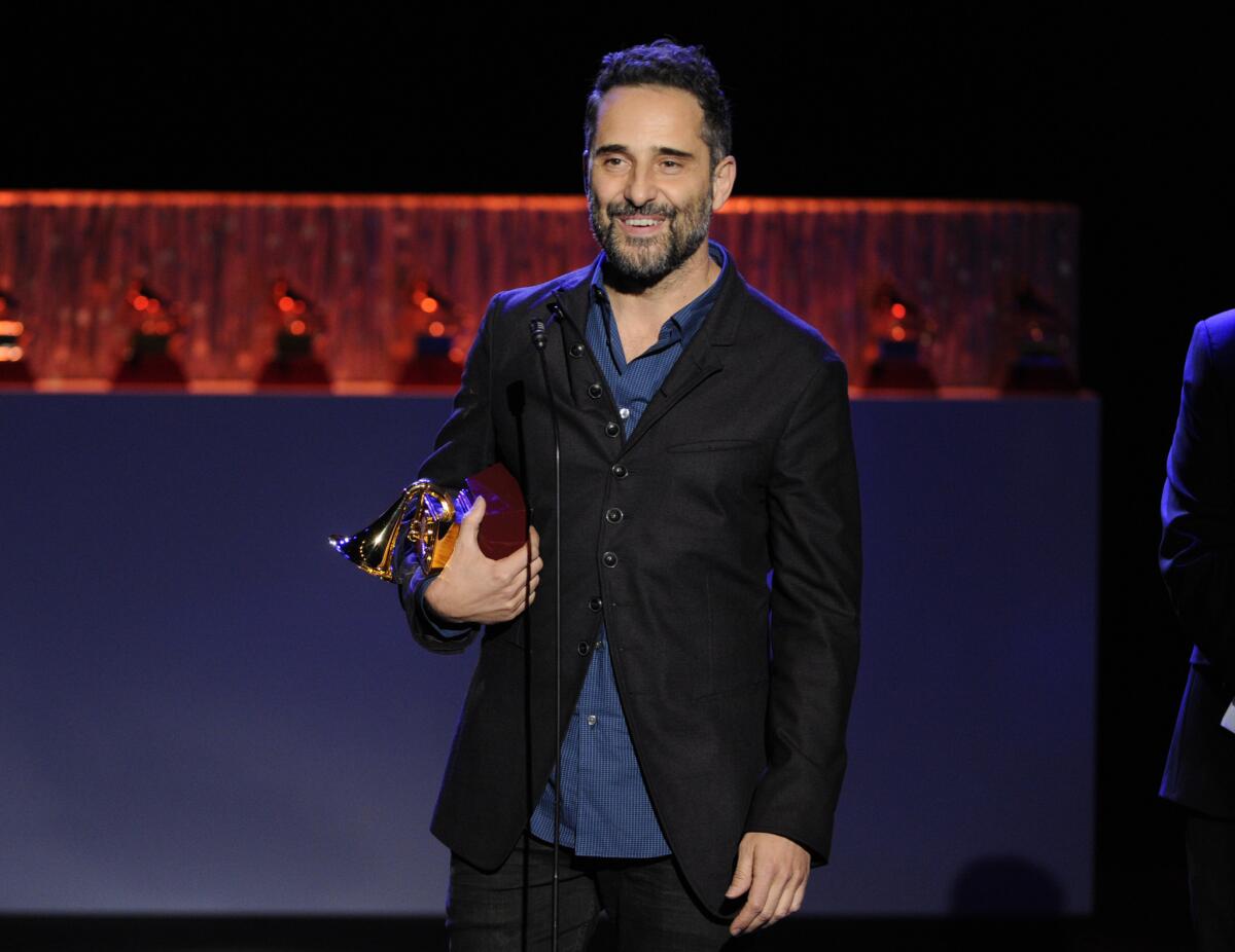 Singer-songwriter Jorge Drexler accepts the Latin Grammy for record of the year for his album "Bailar En La Cueva," which featured Ana Tijoux, during a Nov. 20 ceremony in Las Vegas.