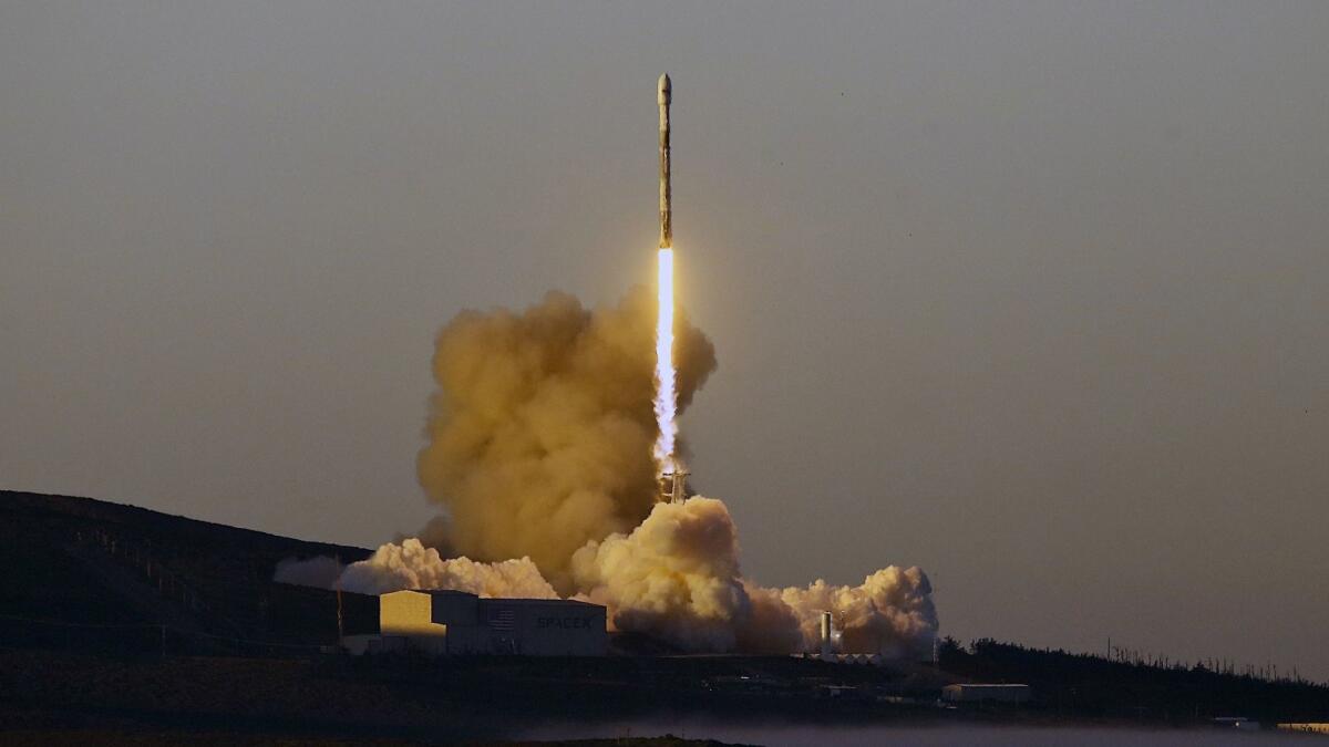 A SpaceX Falcon 9 rocket lifts off from Vandenberg Air Force Base in California on March 30.