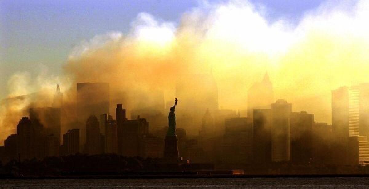 Manhattan, shrouded in smoke from the collapse of the World Trade Center, four days after the Sept. 11, 2001 terrorist attacks.
