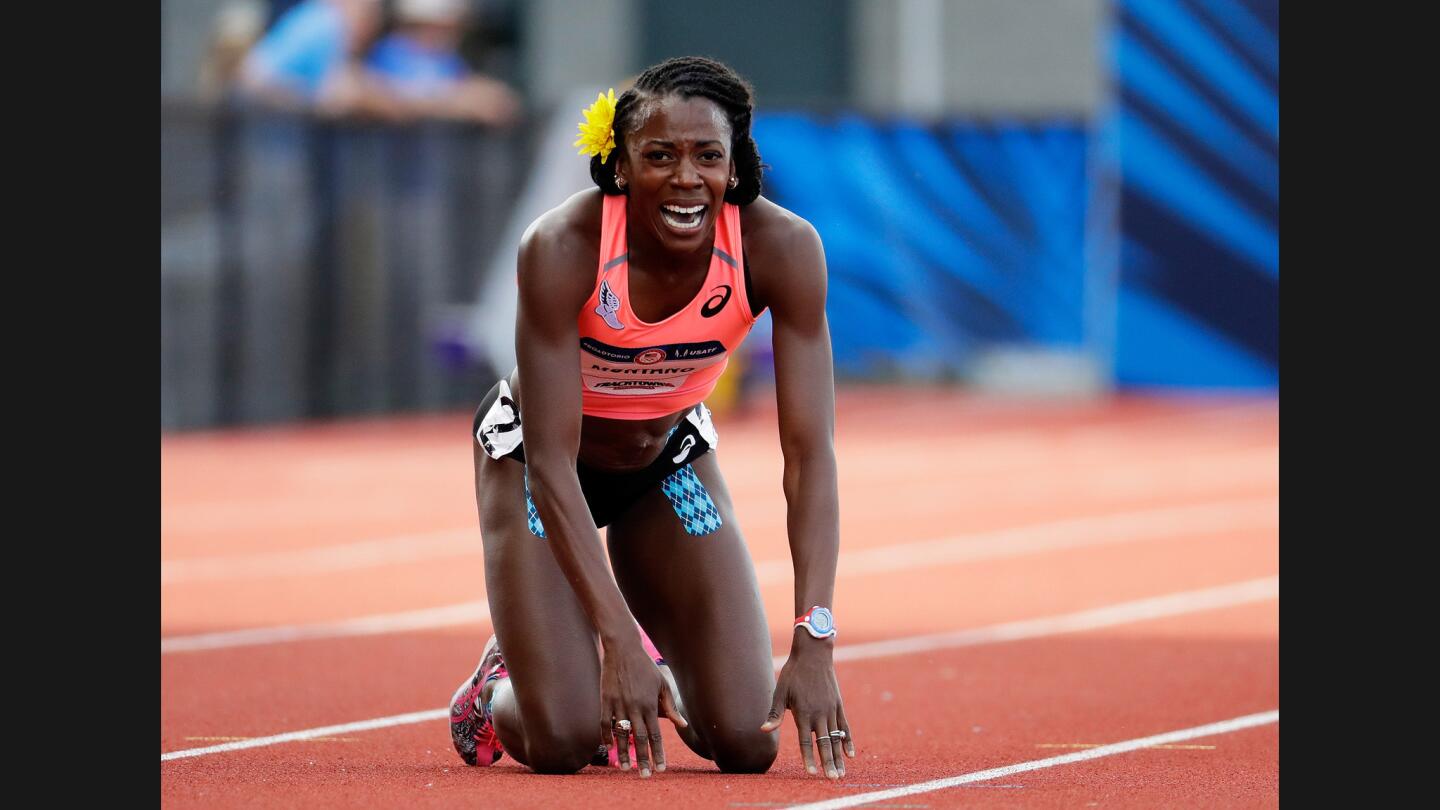 Alysia Montano cries in anguish after tripping and falling in the Women's 800 meter finals. Montano was favored to win the event.
