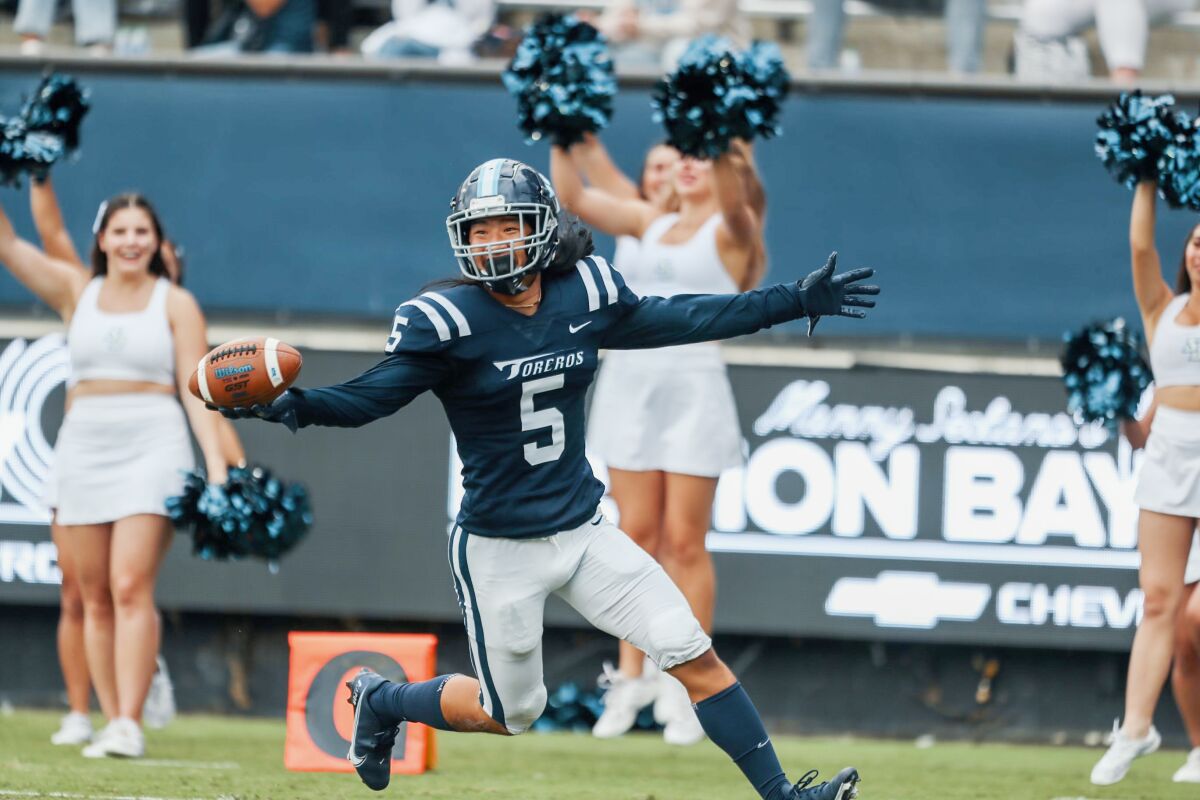 Skies open up, Toreros storm Blue Hose for Homecoming win - The San Diego  Union-Tribune