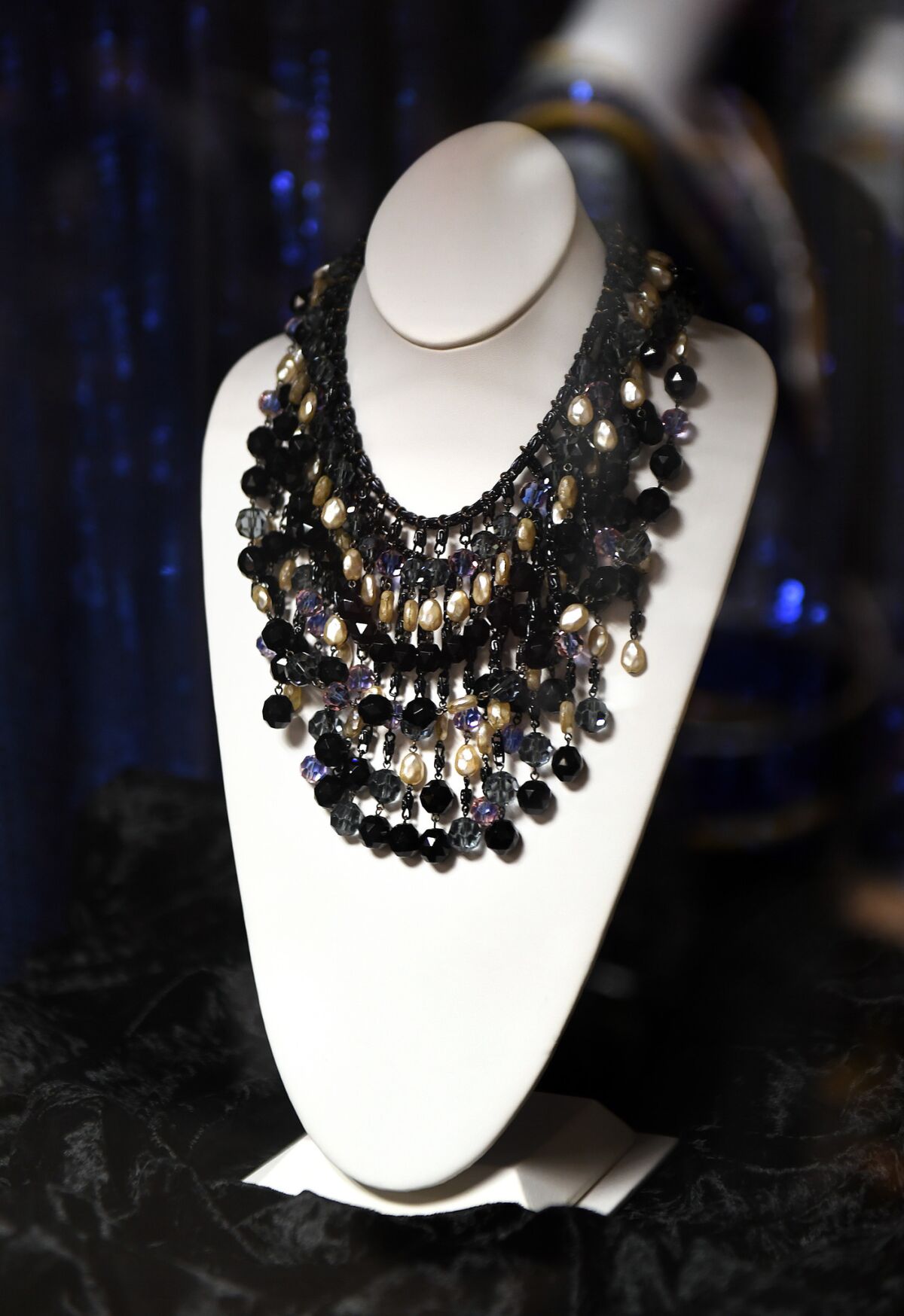 A necklace worn by Audrey Hepburn in "Breakfast at Tiffany's" is displayed in the Paramount archives.