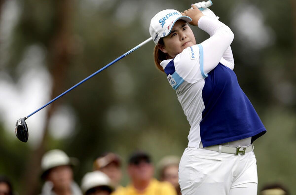 Inbee Park follows through on her tee shot at No. 3 on Sunday during the final round of the Kraft Nabisco Championship.