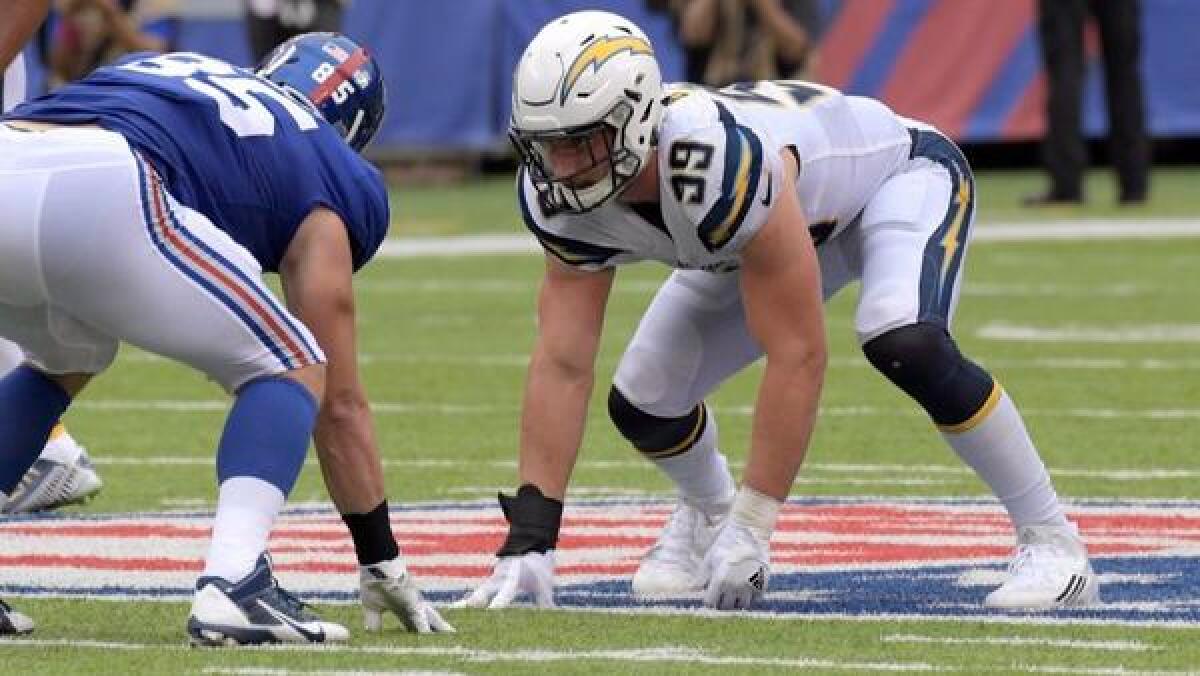 Chargers defensive end Joey Bosa, right, lines up against New York Giants tight end Rhett Ellison on Oct. 8.