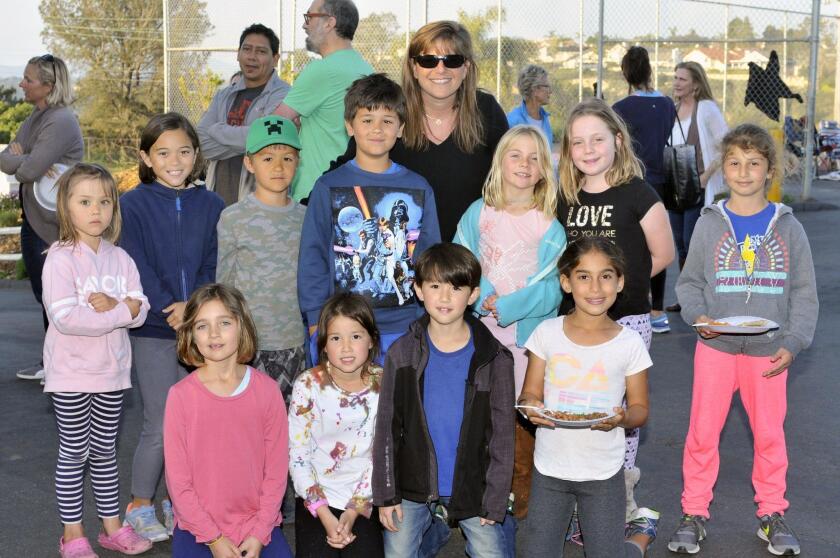Principal Julie Lerner and some of her students