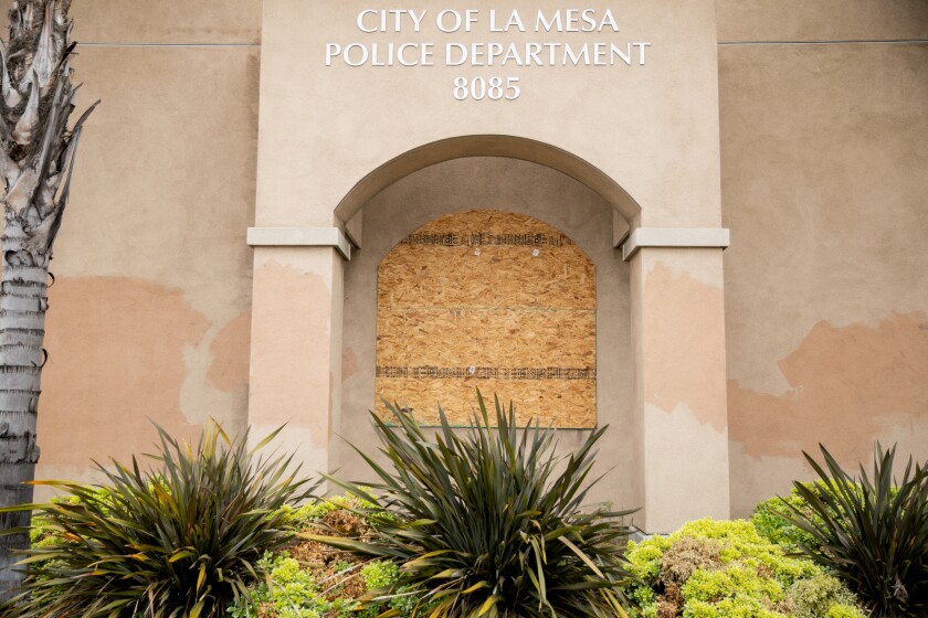 Windows were boarded up at the La Mesa police station on June 4.