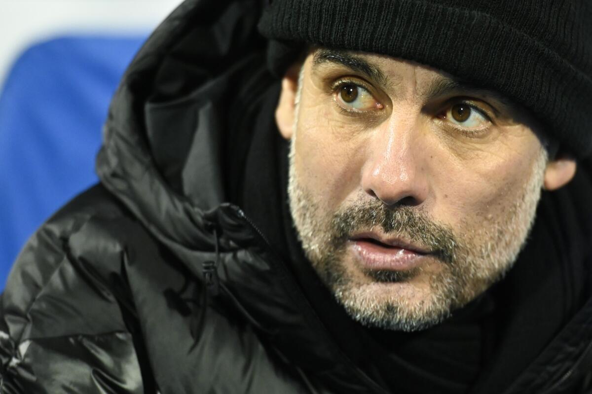 Manchester City's Spanish manager Pep Guardiola looks on during the UEFA Champions League Group C football match between GNK Dinamo Zagreb and Manchester City FC at the Maksimir Stadium in Zagreb on December 11, 2019. (Photo by Denis LOVROVIC / AFP) (Photo by DENIS LOVROVIC/AFP via Getty Images) ** OUTS - ELSENT, FPG, CM - OUTS * NM, PH, VA if sourced by CT, LA or MoD **