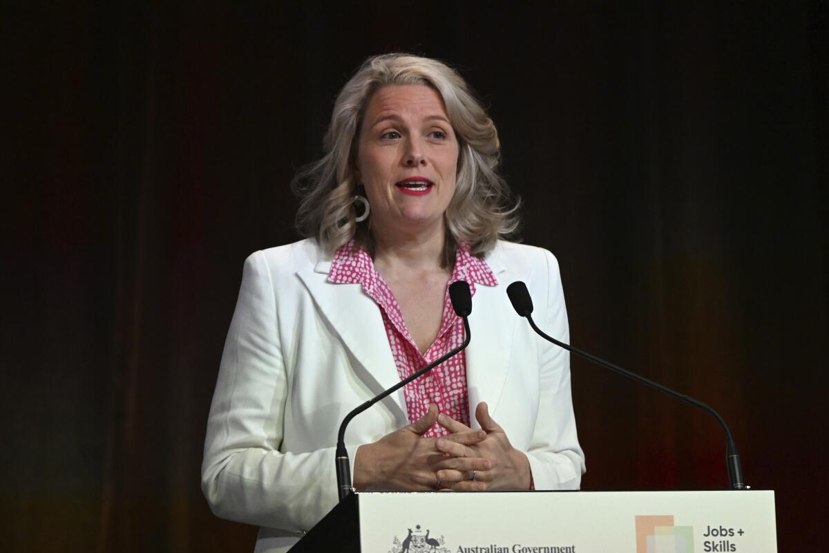 Australia's Home Affairs Minister Clare O’Neil speaks at the Jobs and Skills Summit in Canberra, Friday, Sept. 2, 2022. O'Neil announced it will increase its permanent immigration intake by 35,000 to 195,000 in the current fiscal year as the nation grapples with skills and labor shortages. (Mick Tsikas/AAP Image via AP)
