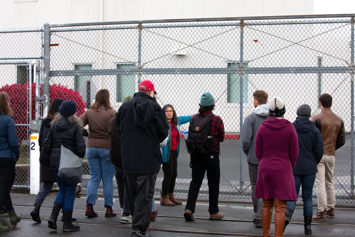 Maru Mora-Villalpando, an activist with La Resistencia and Mijente, leads a protest Oct. 19 outside the Northwest ICE Processing Center in Tacoma.