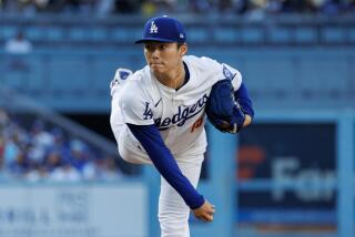 LOS ANGELES, CA - JUNE 15, 2024: Los Angeles Dodgers starting pitcher Yoshinobu Yamamoto (18) throws against the Kansas City Royals in the first inning at Dodger Stadium on June 15, 2024 in Los Angeles, California. He left the game after two innings because of tricep tightness.(Gina Ferazzi / Los Angeles Times)