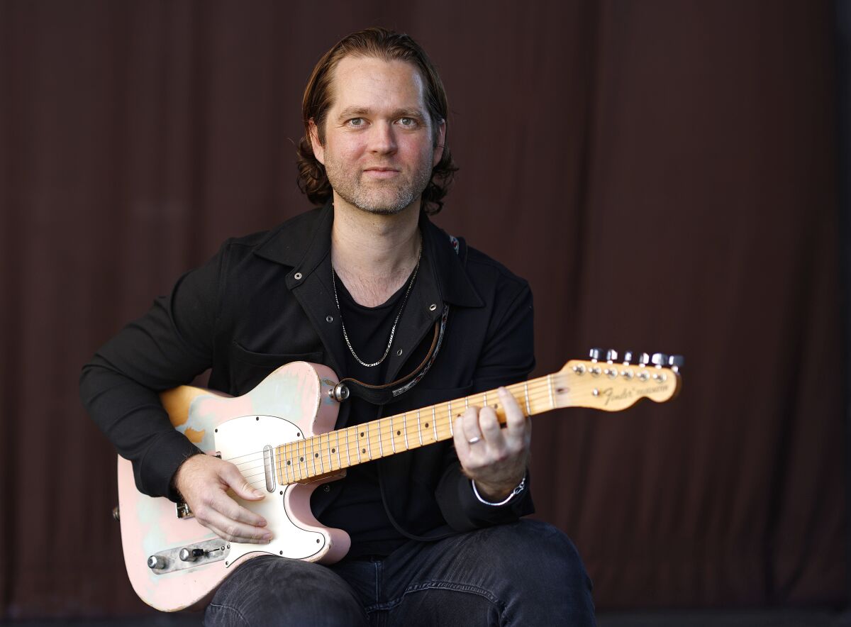 Guitarist Heath Farmer of the band Coastal Wolves.