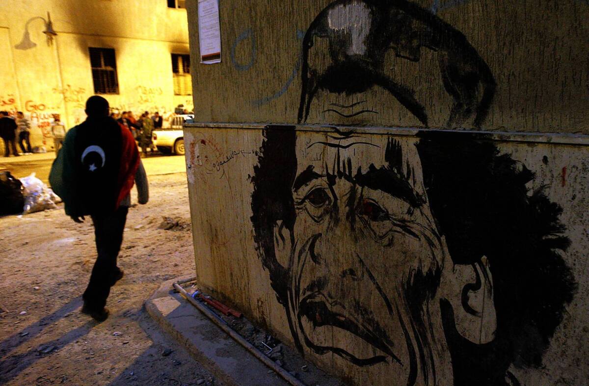 The eastern city of Benghazi, Libya, was an opposition stronghold in the uprising against Moammar Kadafi. In spring 2011, caricatures of Kadafi, such as this oen, were visible around the city.