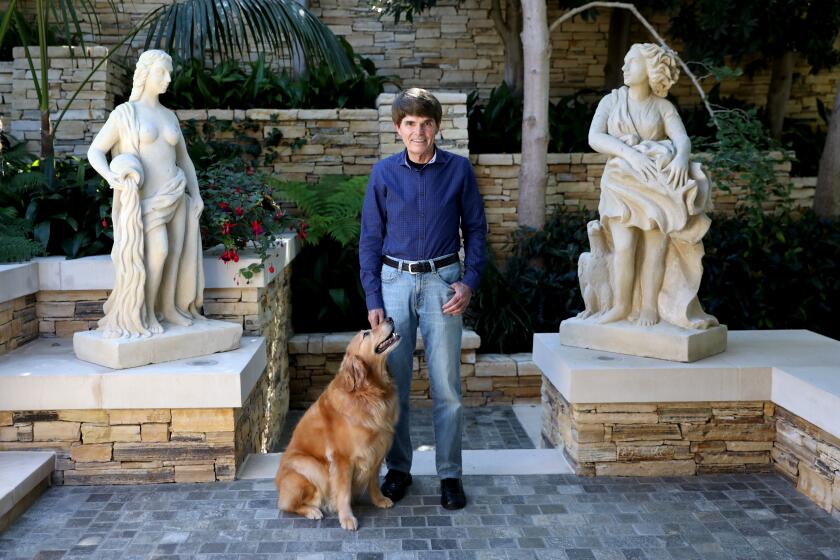 NEWPORT BEACH, CALIF. -- MONDAY, OCTOBER 21, 2019: Dean Koontz, bestselling author, with Elsa, at his home in Newport Beach, Calif., on Oct. 21, 2019. Latest Nameless series. (Gary Coronado / Los Angeles Times)