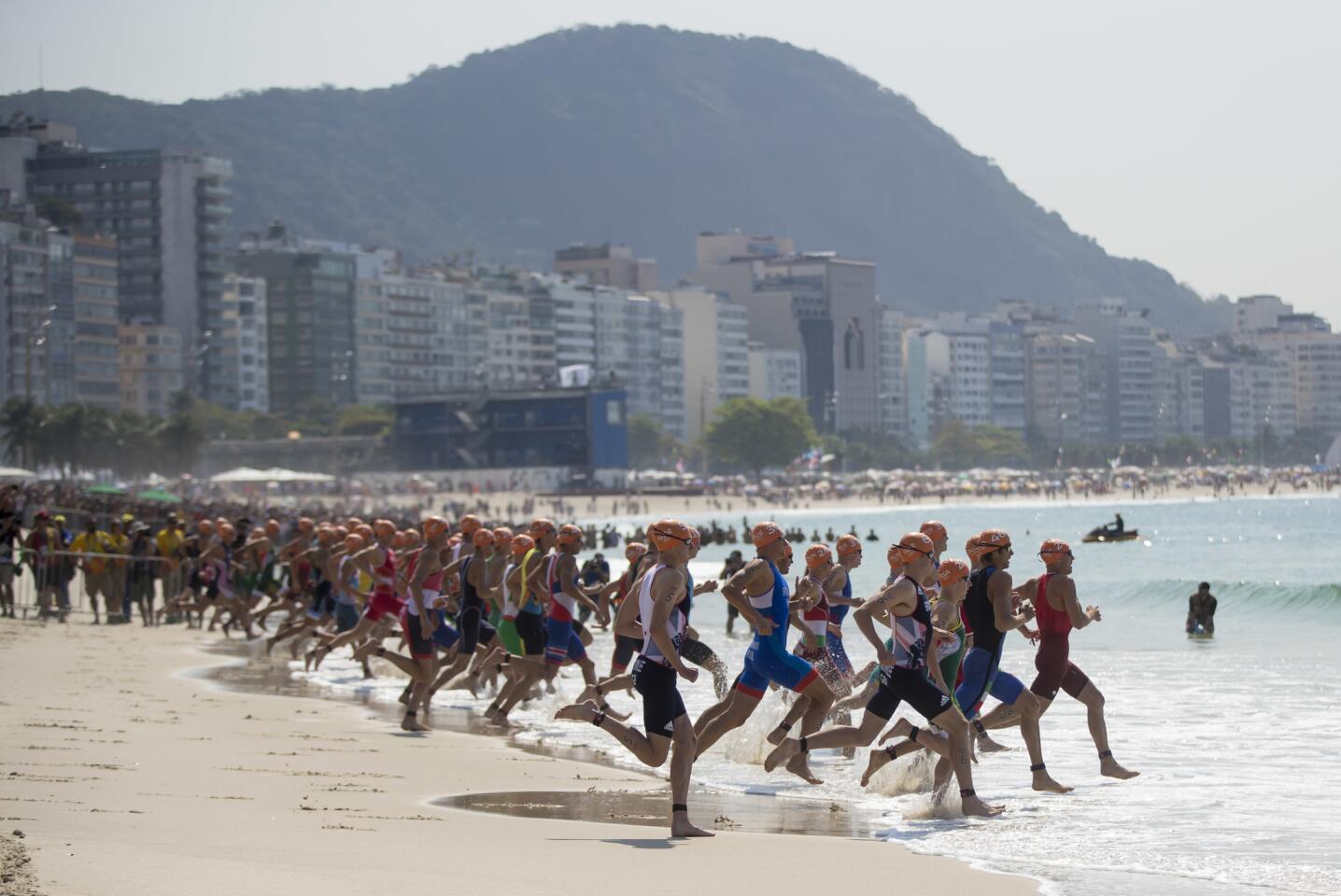 Swimmers compete in triathlon