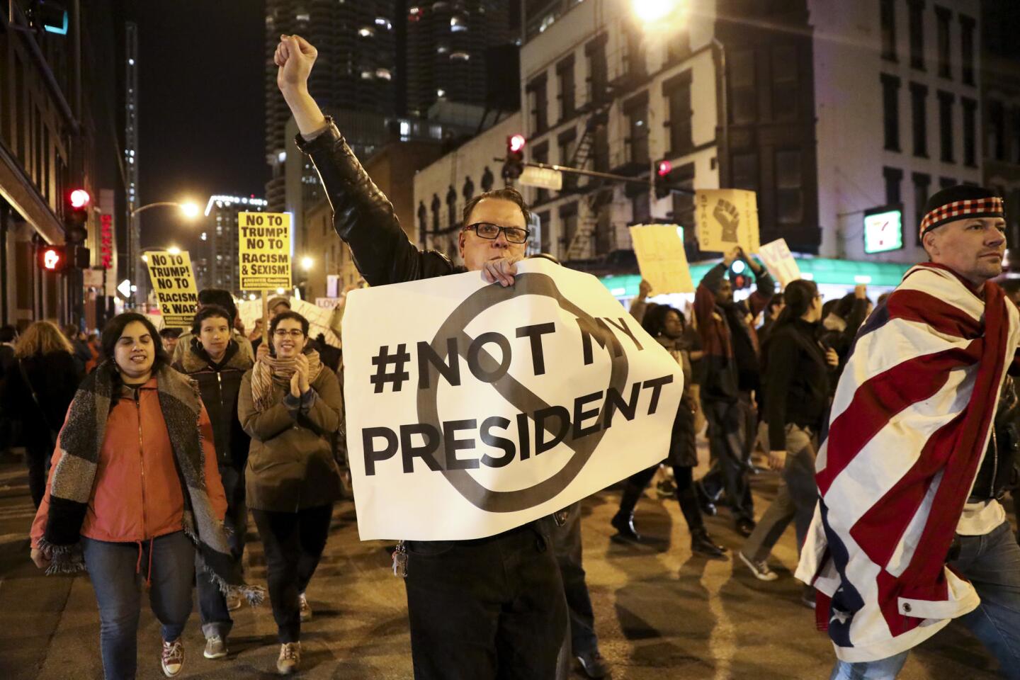 Anti-Trump protesters rally in downtown Chicago
