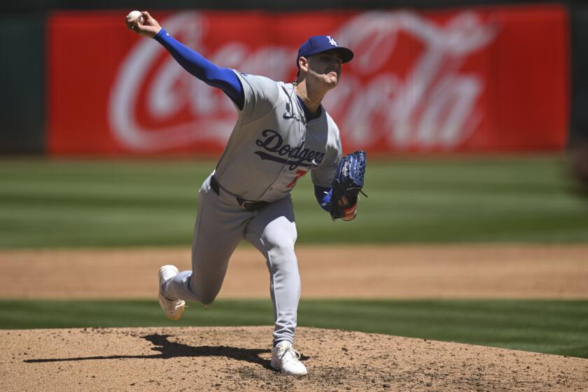 Los Angeles Dodgers pitcher River Ryan throws against the Oakland Athletics during the third inning of a baseball game Sunday, Aug. 4, 2024, in Oakland, Calif. (AP Photo/Eakin Howard)