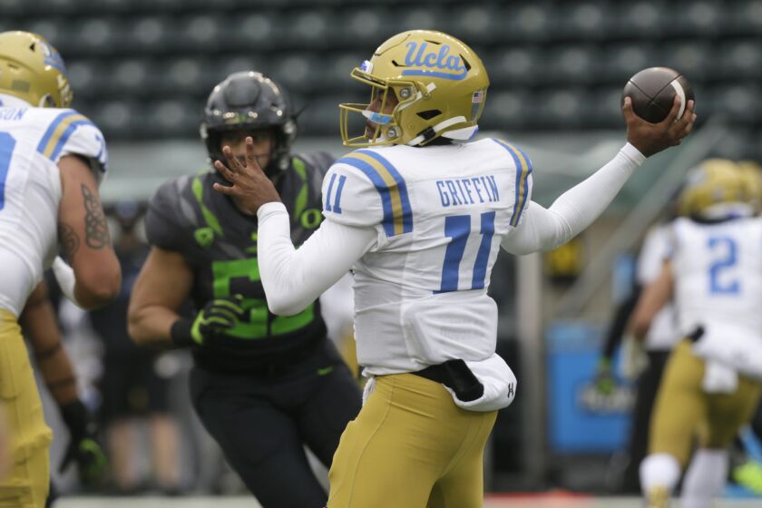 UCLA's Chase Griffin throws downfield against Oregon during the second quarter Nov. 21, 2020, in Eugene, Ore.