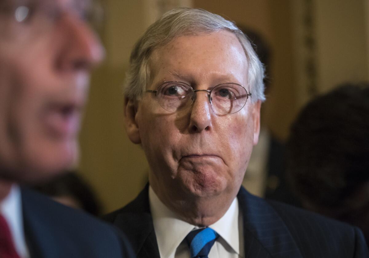 Senate Majority Leader Mitch McConnell (R-Ky.) appears at a news conference on Capitol Hill.