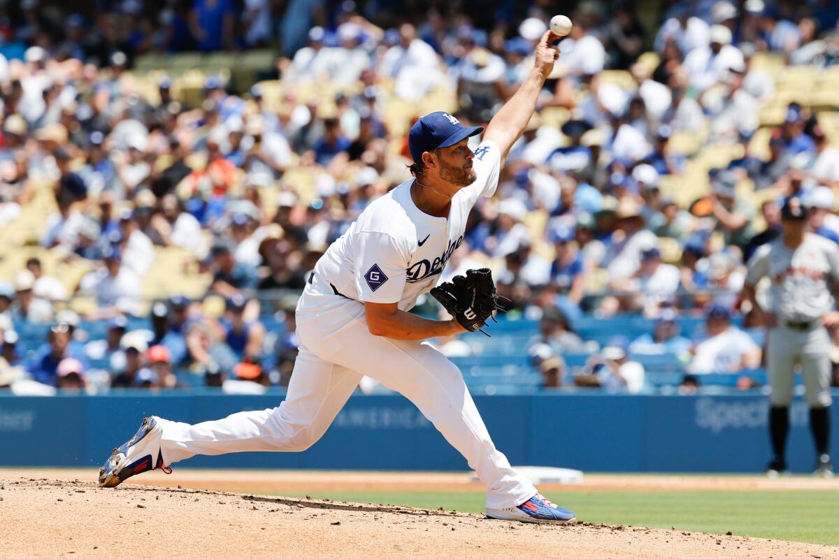 Dodgers starting pitcher Clayton Kershaw delivers a throw in the third inning against the San Francisco Giants