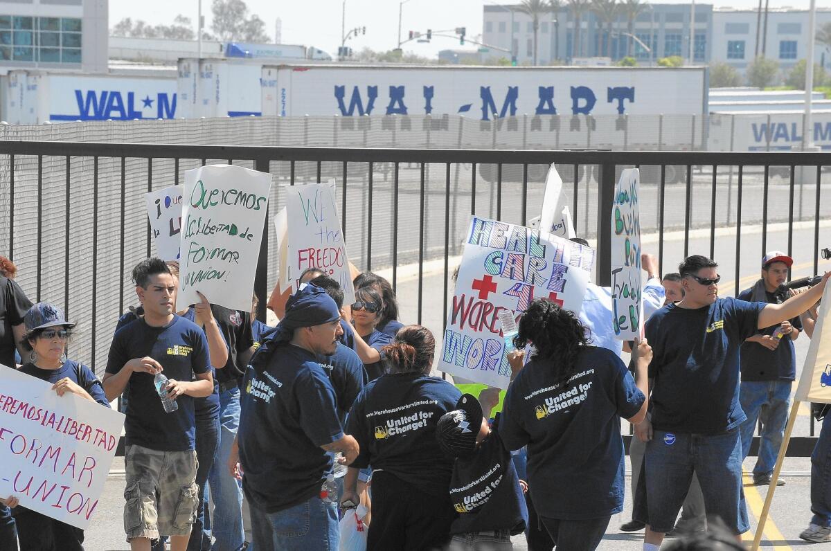 The NLRB ruling could change the operations of high-profile companies such as Wal-Mart, which subcontracts out warehouse work.