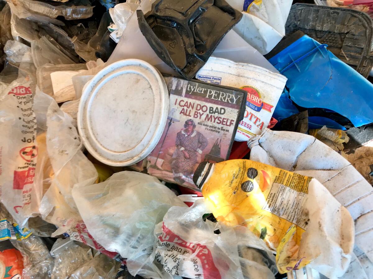 This paper bag in which local shopkeeper gave me groceries (in India). In  many parts of India, plastic carry bags are banned. This bag is made from  old newspaper and handle is