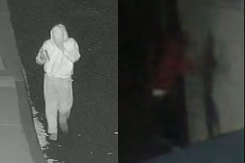 Authorities released photos of a suspect they say spray painted slurs at San Dieguito Academy High School.