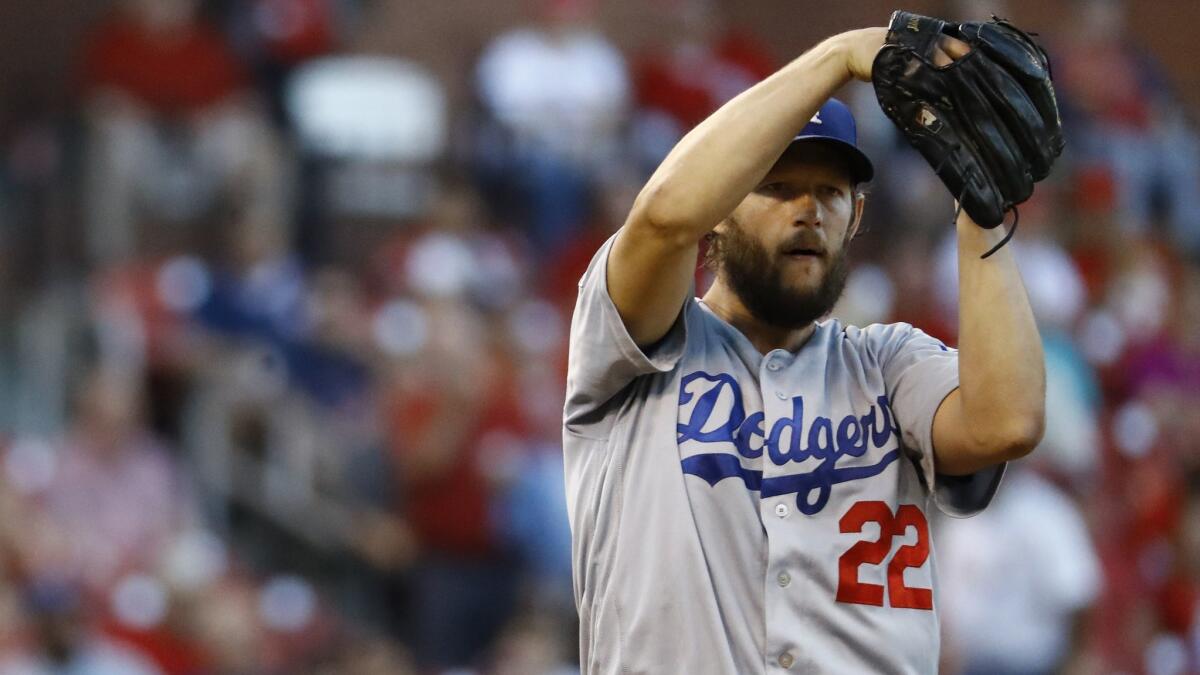 Dodgers starting pitcher Clayton Kershaw works from the stretch during the first inning against the St. Louis Cardinals.