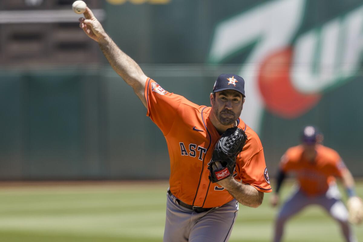 Houston Astros' Justin Verlander pitches against an Oakland Athletics batter during the first inning of a baseball game in Oakland, Calif., Wednesday, June 1, 2022. (AP Photo/John Hefti)