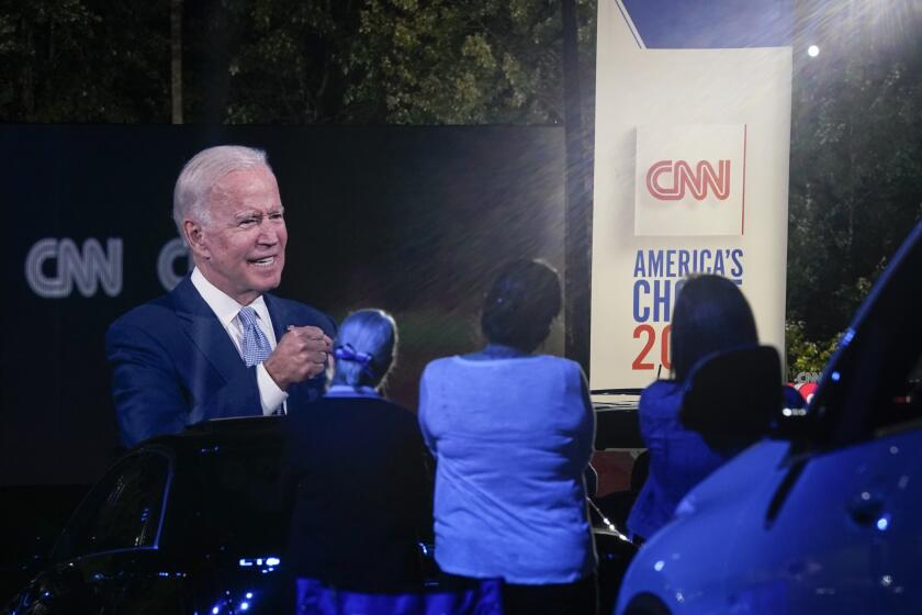 MOOSIC, PA - SEPTEMBER 17: Audience members listen as Democratic presidential nominee and former Vice President Joe Biden participates in a CNN town hall event on September 17, 2020 in Moosic, Pennsylvania. Due to the coronavirus, the event is being held outside with audience members in their cars. Biden grew up nearby in Scranton, Pennsylvania. (Photo by Drew Angerer/Getty Images)